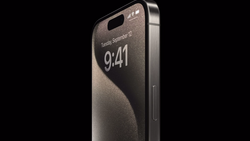 Smartphone with edge-to-edge display and minimal bezel design shown at an angle against a dark background.
