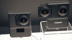 Two Canon PowerShot cameras displayed side by side, with single and dual lens configurations.