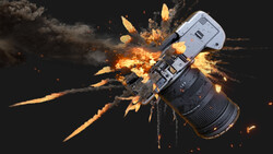 Camera lens exploding in a dramatic burst of fire and smoke against a black background.