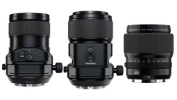 Three black telephoto lenses arranged side by side, displaying different barrel lengths and focusing mechanisms.