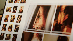 Contact sheet and enlarged prints showing portrait photography with warm, golden lighting and intimate framing.