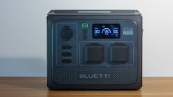 Bluetti portable power station with dual AC outlets and digital display showing power metrics.