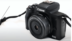 Canon EOS M50 Mark II mirrorless camera with attached 15-45mm kit lens against white background.