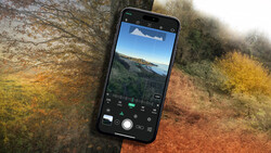 iPhone displaying mobile photography app interface with landscape mountain and water scene