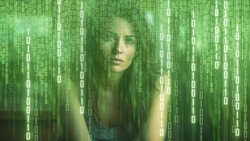 Woman's face overlaid with cascading green digital code and binary digits.