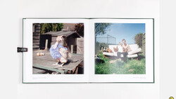 Open photo album spread displaying two vintage color photographs from different outdoor settings.