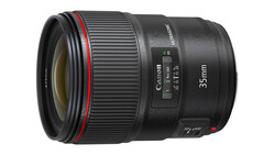 Canon 35mm prime lens with red ring and autofocus mechanism visible on black barrel.