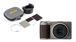 Ricoh GR III compact digital camera with filter kit and carrying case.