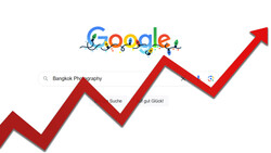 Screenshot showing Google search interface with upward trending red arrow overlay.