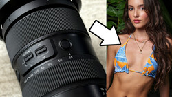 Telephoto zoom lens with focus ring and distance scale displayed alongside portrait of woman wearing patterned bikini top.