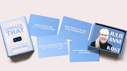 Unpack That interview card deck with blue question cards and a portrait card featuring Julie Anne Kost.
