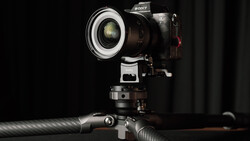 Sony mirrorless camera mounted on tripod with ring light modifier attached to lens.