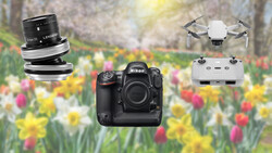 Nikon DSLR camera body with interchangeable lenses and a compact drone against a blurred floral background.