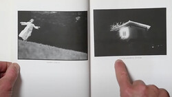 Two black and white photographs displayed in an open book or portfolio spread.