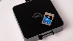 OWC brand external storage device with a 480GB SD memory card displayed on its black surface.