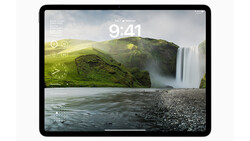 Screenshot of iPad lock screen displaying a waterfall landscape with time 9:41 and weather widgets.