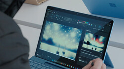 Screenshot of photo editing software with landscape image displayed on laptop screen.