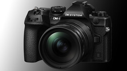 OM System OM-1 mirrorless camera with attached lens, front three-quarter view against neutral background.