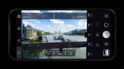 Screenshot of iPhone video editing interface showing a riverside cityscape with boats and buildings.