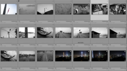 Contact sheet of black and white film negatives displaying architectural and landscape photography across multiple rows.