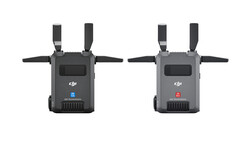 Two DJI wireless transmitter units shown front-facing with extended antenna arms.