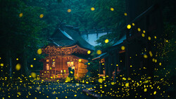 Traditional pagoda illuminated by warm lights amid thousands of glowing fireflies in a dark forest.