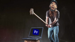 Person with axe poised above laptop displaying Adobe Premiere Pro logo against dark background.