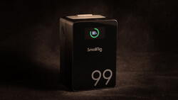 Smallrig 99 portable power station with illuminated display showing battery percentage indicator.