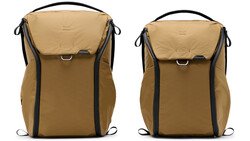 Two tan and black camera backpacks displayed side by side, showing different size options.