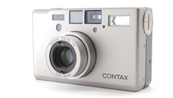 Contax compact film camera with Carl Zeiss lens, shown from front-right angle against white background.