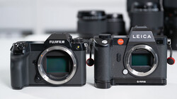 Fujifilm and Leica mirrorless cameras displayed side-by-side, showing sensor openings and control layouts.