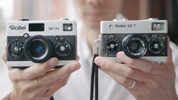 Two Rollei 35mm film cameras held in hands side by side for comparison.