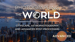 Course title graphic for 'Photographing the World' featuring an aerial cityscape at dusk with dramatic clouds.
