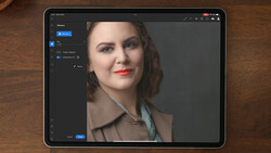 Screenshot of portrait editing software showing a woman with styled hair and red lipstick against a neutral background.