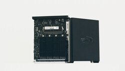 Computer circuit board and black cooling heatsink assembly displayed against white background.