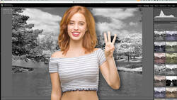 Woman with red hair waving at camera against selective color composite background.