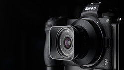 Nikon Z7 II mirrorless camera with attached lens, photographed against a black background.
