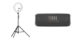 Ring light on tripod stand and portable JBL speaker displayed side by side.