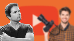 Man in dark v-neck shirt looking upward with thoughtful expression against orange background.