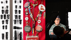 Photography equipment display showing lens collection, red jacket with badges, and studio lighting setup with photographer.