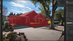 Red house with selection overlay displayed in photo editing software interface.