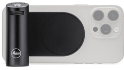 Leica smartphone camera grip mounted on iPhone 14 Pro with black cylindrical lens attachment.