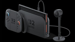 Product photograph of gaming console with detached controllers and wireless headset displayed against black background.