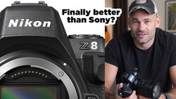 Nikon Z8 camera body displayed next to a person holding a telephoto lens.
