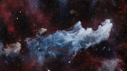 Blue and white nebula cloud formation against a deep red and dark starfield.