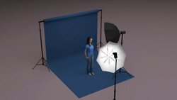 Studio setup diagram showing a model positioned in front of a blue backdrop with professional lighting equipment including umbrellas and reflectors.