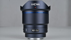 Laowa 12mm f/2.8 ultra-wide angle lens with black barrel and blue accent ring, shown in product display orientation.