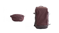 Two burgundy travel bags shown side by side—a compact waist pack on the left and a larger convertible backpack on the right.