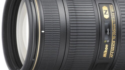 Nikon AF-S 24-70mm f/2.8G telephoto zoom lens with gold lettering and ribbed focus ring.