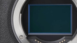 Camera mirrorless sensor with blue rectangular frame displayed in open mirror box.